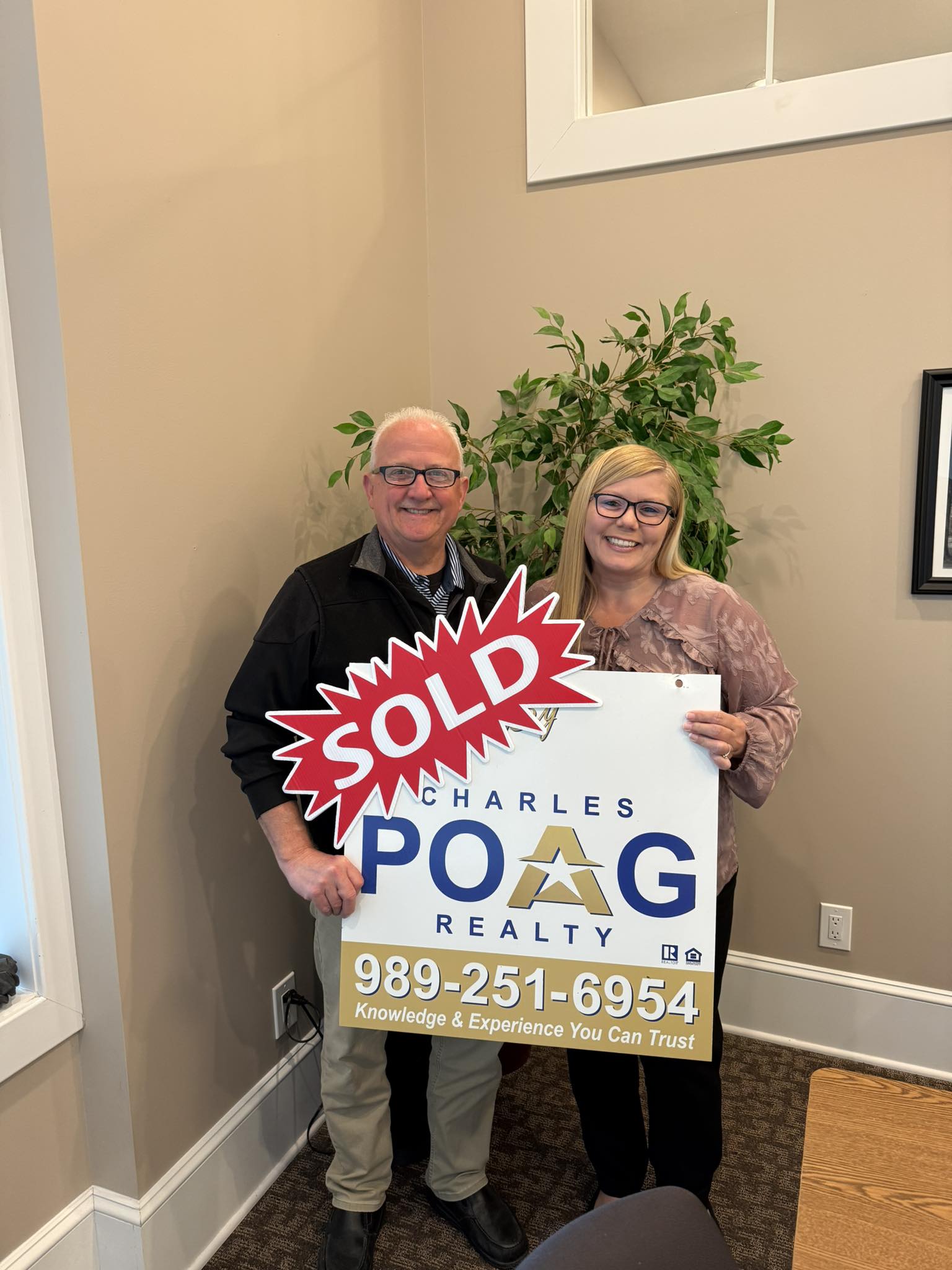 Charles Poag with Jim and Christy at closing